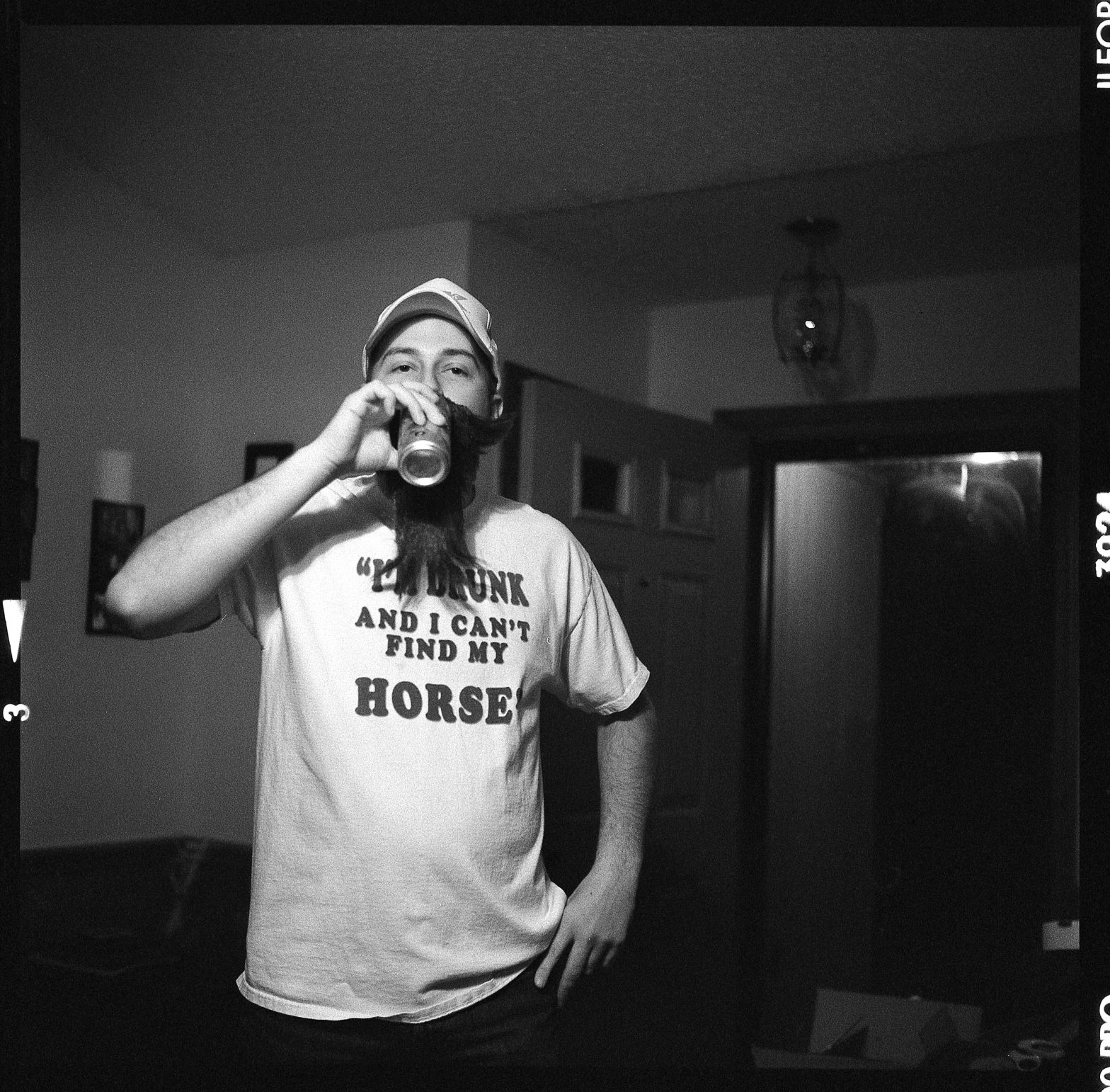 medium format film, man in I'm drunk and can't find my horse shirt